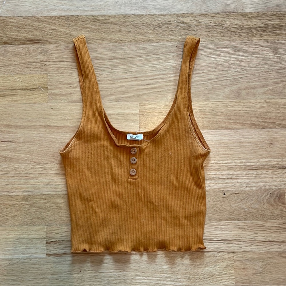 a brownish orange tank top